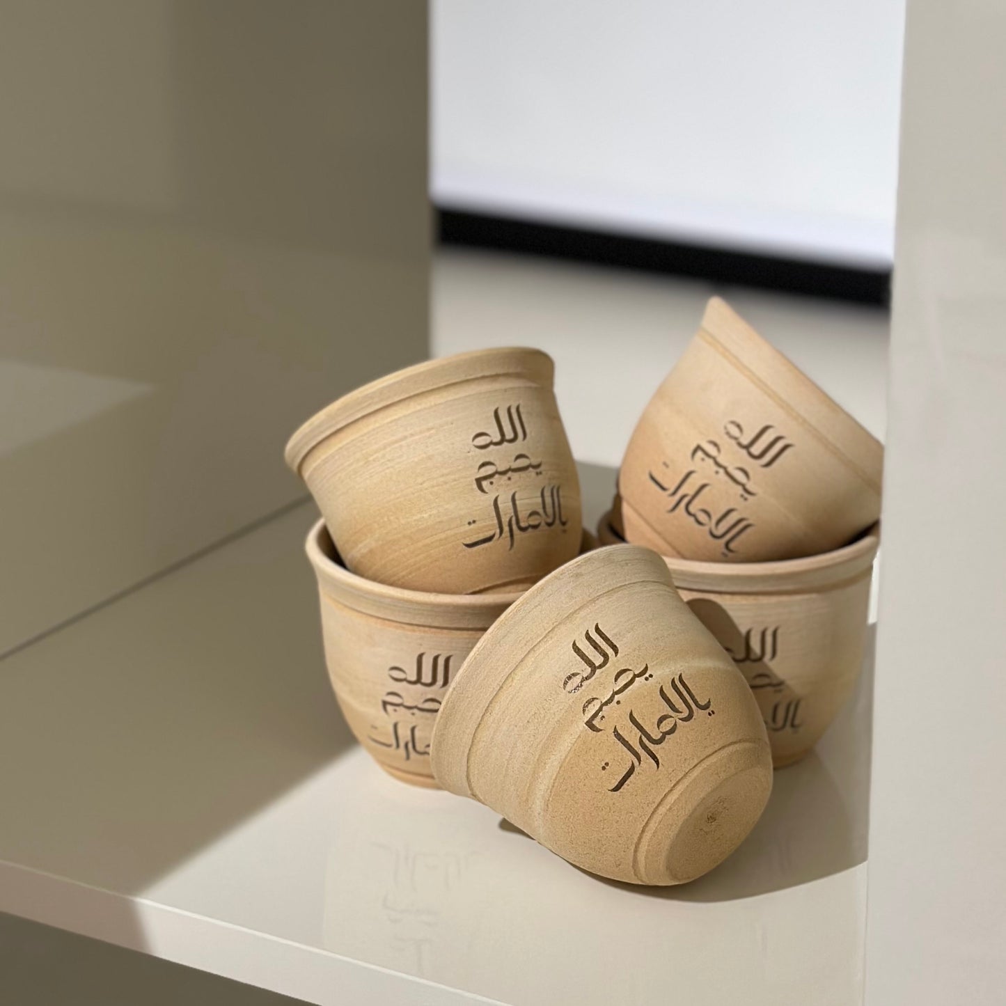 عيد الاتحاد - توزيعات كوب فخار