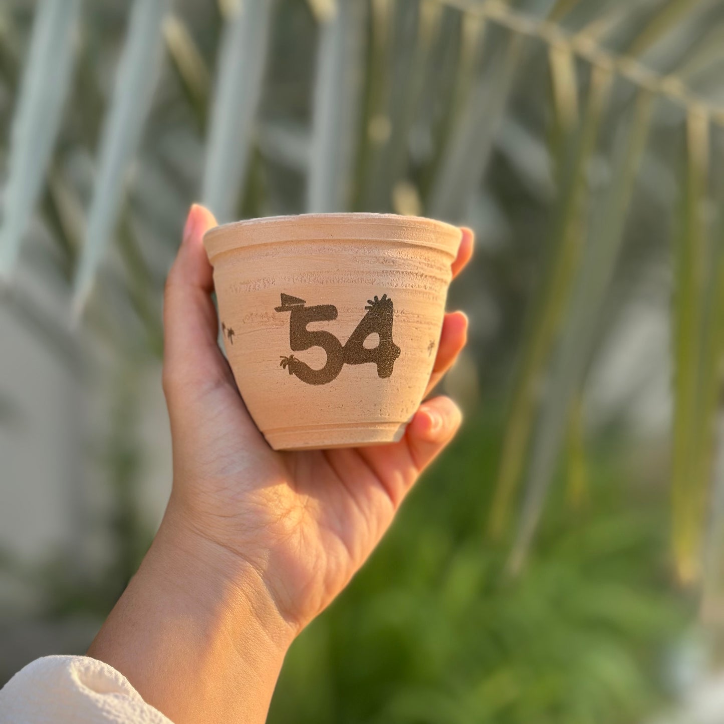 عيد الاتحاد - توزيعات كوب فخار