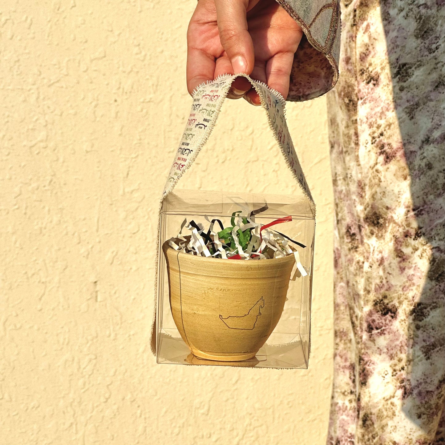 عيد الاتحاد - توزيعات كوب فخار