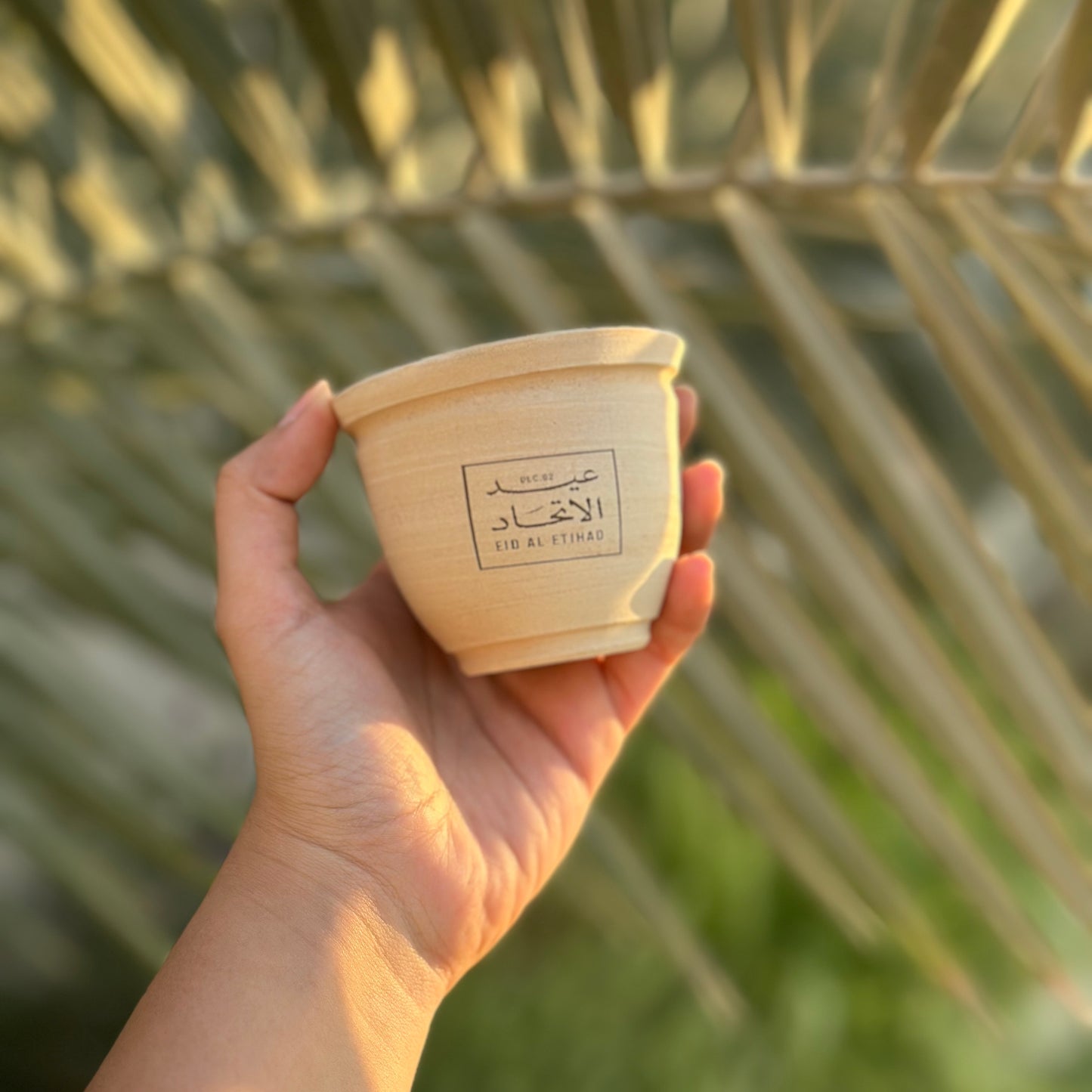 عيد الاتحاد - توزيعات كوب فخار